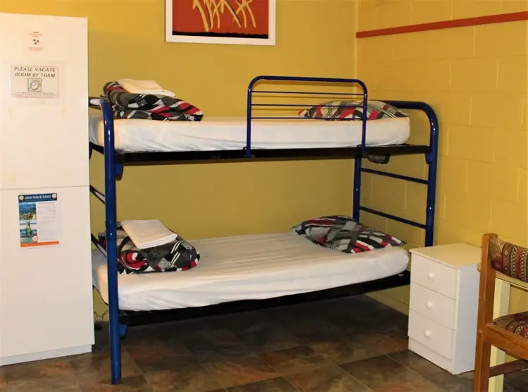 Bunk beds in a hostel dorm in Australia.