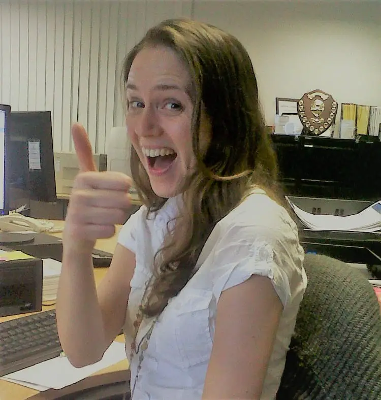 British woman at work in an office before moving to Australia.