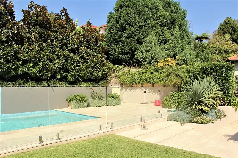 A beautiful swimming pool and garden in an Australian home that a traveller house sat at.