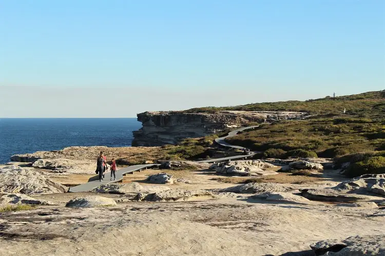 Hikers on the Cape Solander track in Kurnell, Sydney.