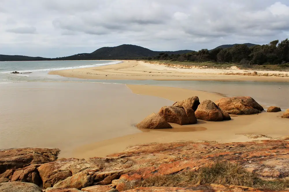 Swirling sand and sea at South West Rocks Beach, NSW.