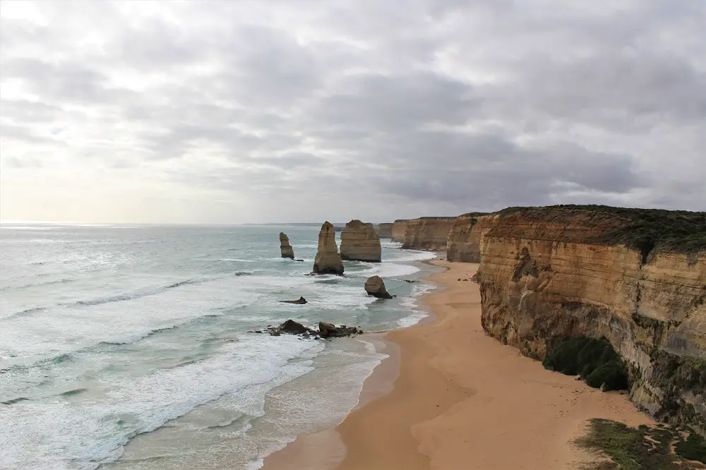 The Twelve Apostles, a famous Great Ocean Road attraction to see on a Melbourne to Adelaide road trip.