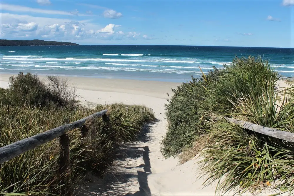  Track down to Cave Beach in Booderee National Park.