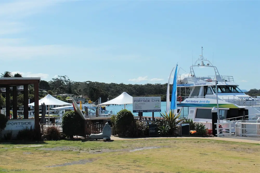 Portside Cafe and dolphin cruise boats in Huskisson, Jervis Bay.