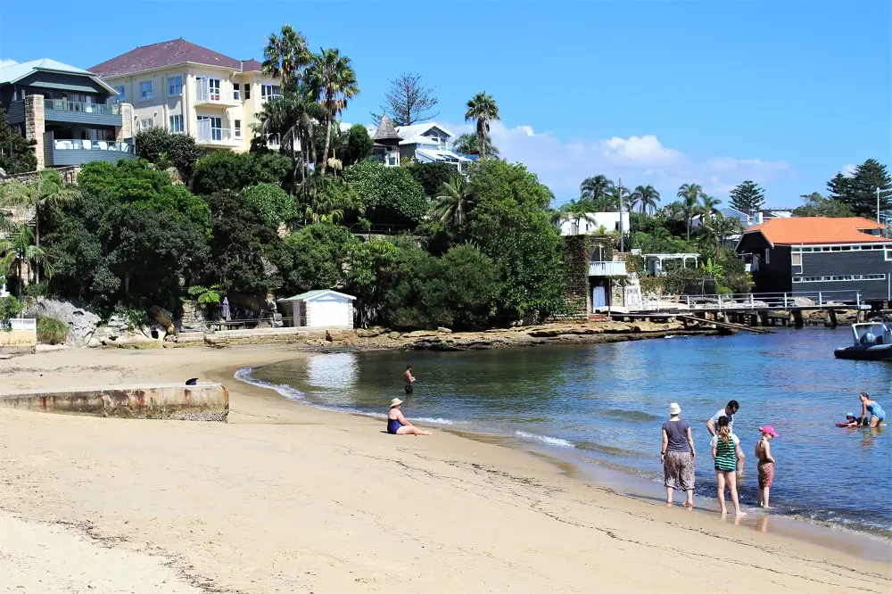 Swimmers and sunbakers in gorgeous Gibson's Beach in Watson's Bay, Sydney.