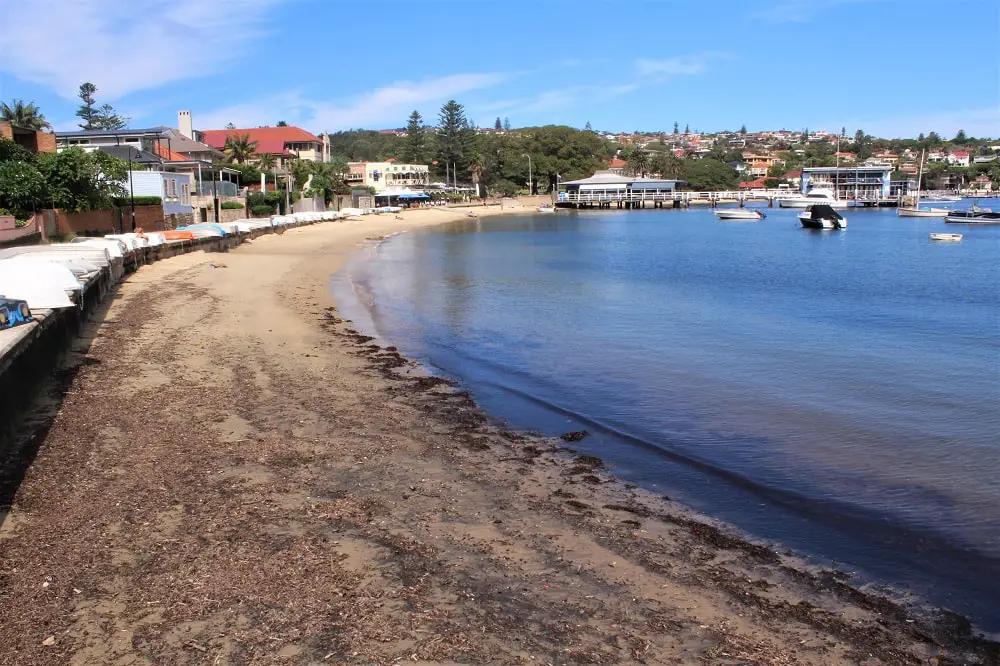 Still, glassy water at Wharf Beach in Watsons Bay, Sydney on a sunny day.