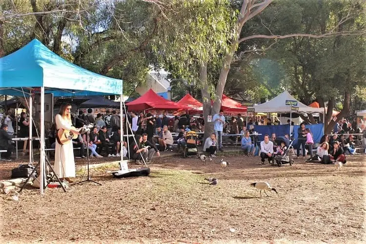 Lady singing at Glebe Market, Sydney.