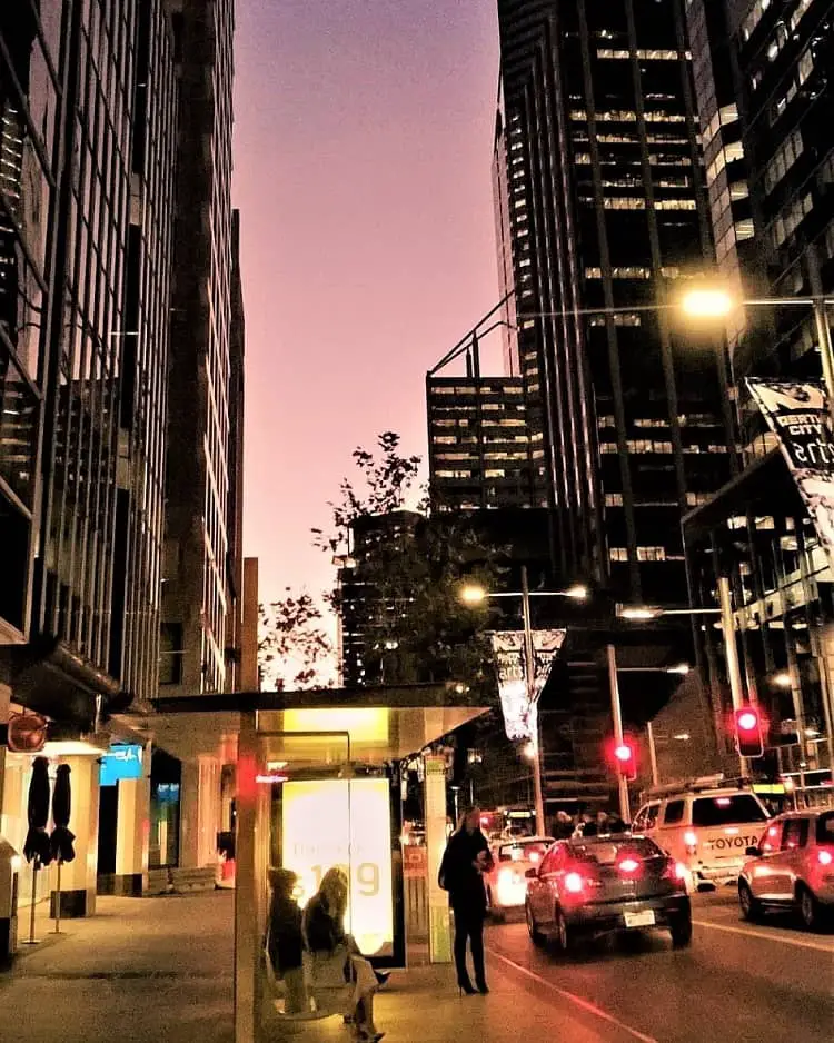 Pink sunset between the skyscrapers at sunset in Perth CBD.