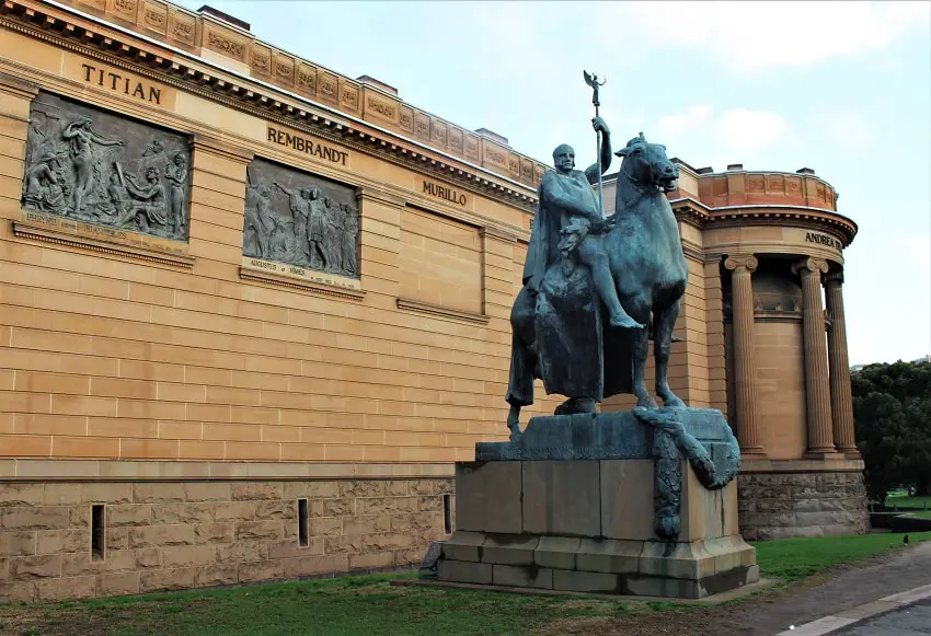 A sculpture of a man on a horse outside the Art Gallery of New South Wales.