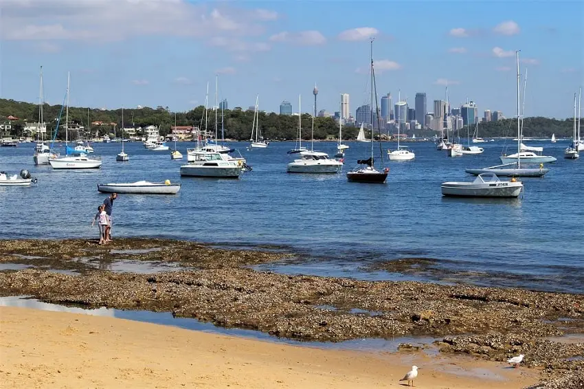 City skyline view from Wharf Beach in Watsons Bay, one of the best things to do in Sydney.
