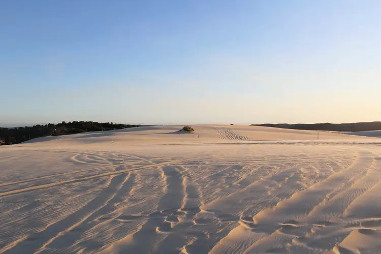 Visit Yeagarup Sand Dunes near Pemberton, Western Australia. Find out how to visit these stunning dunes in D'Entrecasteaux National Park WA by foot or 4WD, where to camp, and see amazing sunset pictures.