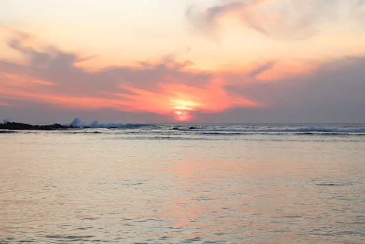 Gorgeous pink sunset at Yallingup Beach in WA.