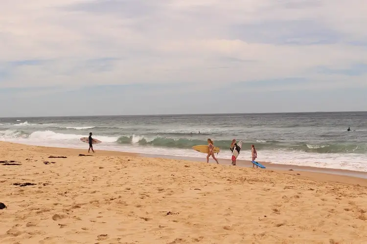 Surfers at Scarborough Wombarra Beach in Wollongong.