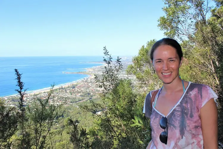 Travel blogger Lisa Bull from Dreaming of Down Under at a lookout on Sublime Point walk in Wollongong.