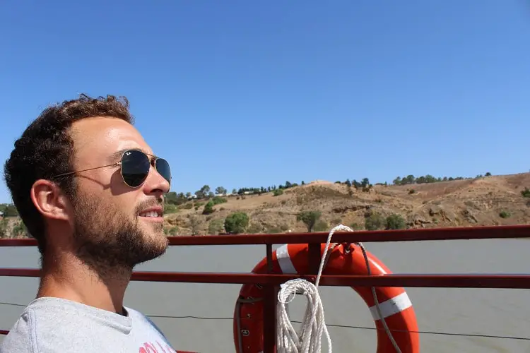 Tourist enjoying a Murray River paddle boat cruise in South Australia.