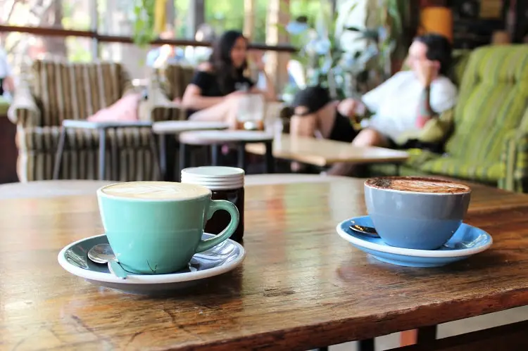 Coffee and patrons at a funky cafe on Brunswick Street in Fitzroy.