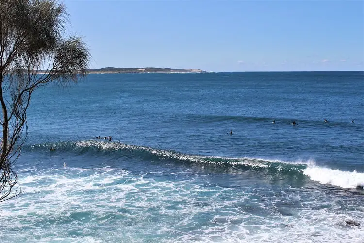 Cronulla surfers viewed from the beach walk.