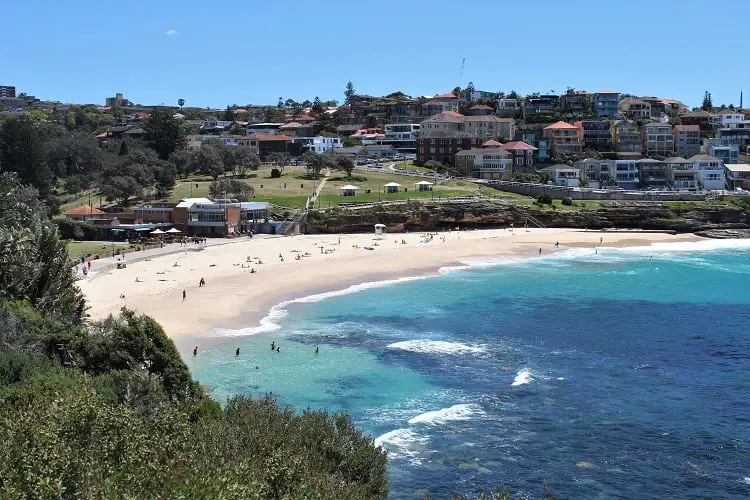 Beautiful Bronte Beach viewed from the cliffs on the Bondi to Coogee walk during Sculptures by the Sea Sydney.