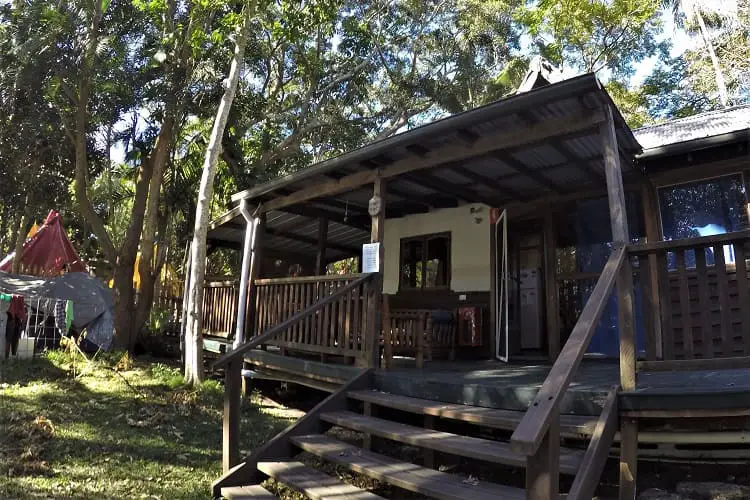 Wooden lakeside cottage at the Arts Factory Lodge in Byron Bay: backpacker accommodation.