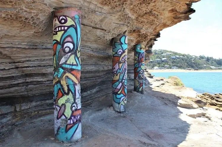 Painted pillars by Palm Beach rock pool in Sydney, Australia.