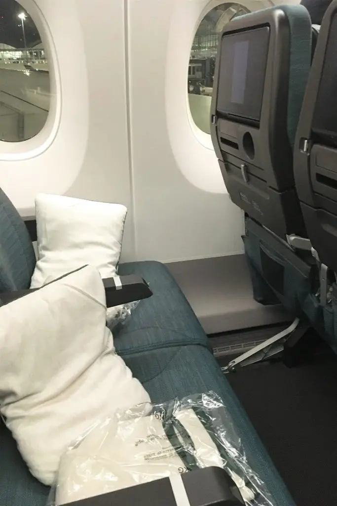 Flying during Covid-19: an empty row of seats on a BA flight from London to Sydney.