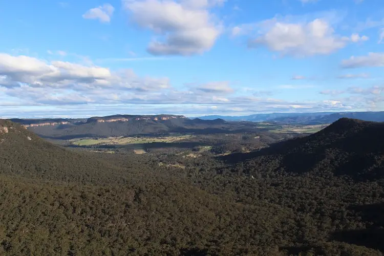 Sweeping views across the Blue Mountains and the flat countryside at Mount Victoria from Mitchell Ridge lookout.