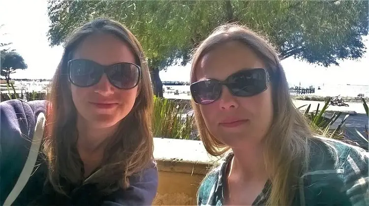 Two female backpackers eating breakfast at The Dome cafe on Rottnest Island.