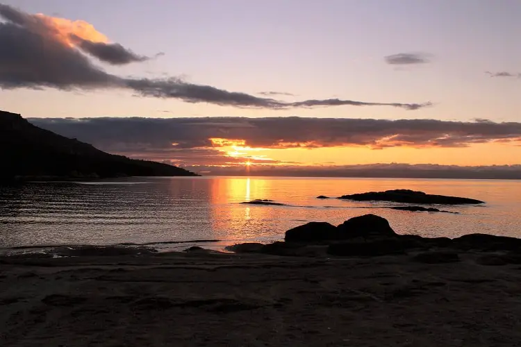 Stunning pink sunset at the camping ground in Honeymoon Bay, Freycinet National Park.