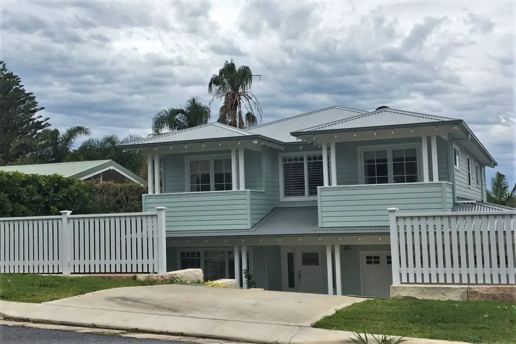 A mint green Hampton style home in Sydney.