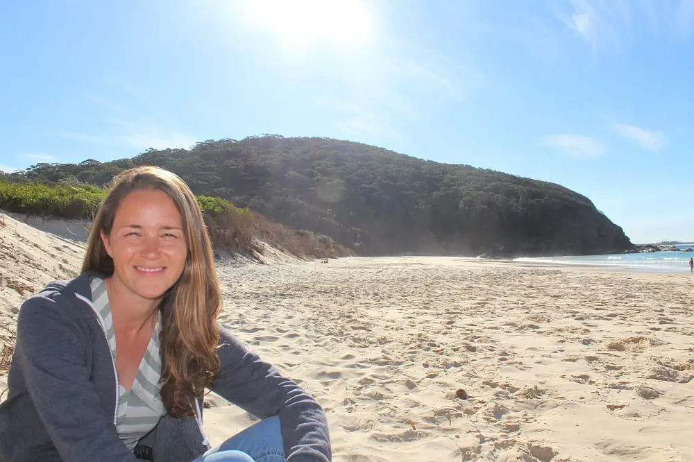 Blogger Lisa Bull on Elizabeth Beach in Booti Booti National Park.
