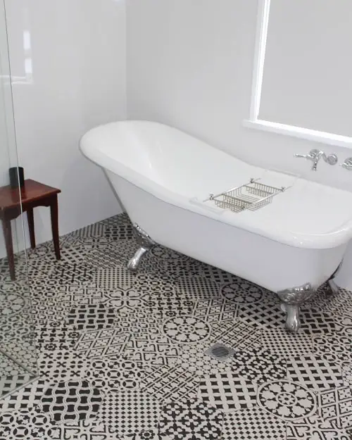 Beautiful roll top bath and tiled floor in Palmyra B&B in Forster NSW.