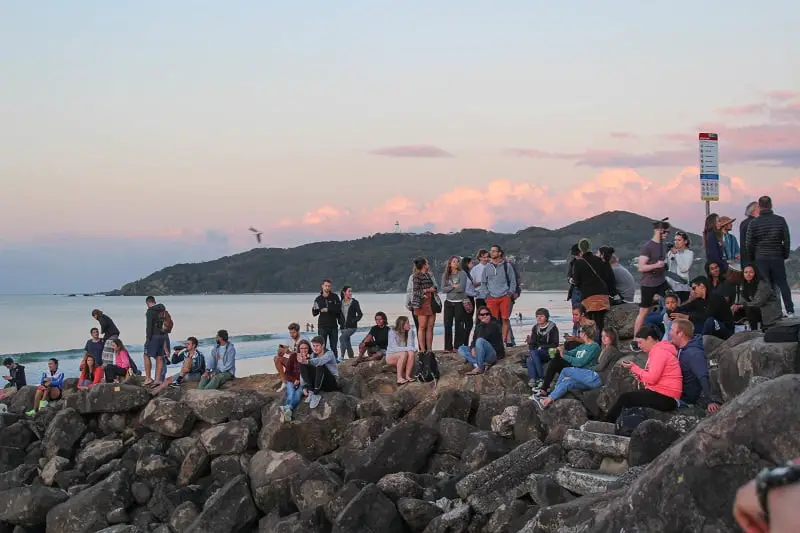 Holidaymakers gathered on the rocks to watch the sunset in Byron Bay, Australia.
