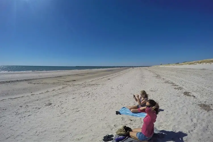 Backpackers on Semaphore Beach, South Australia.