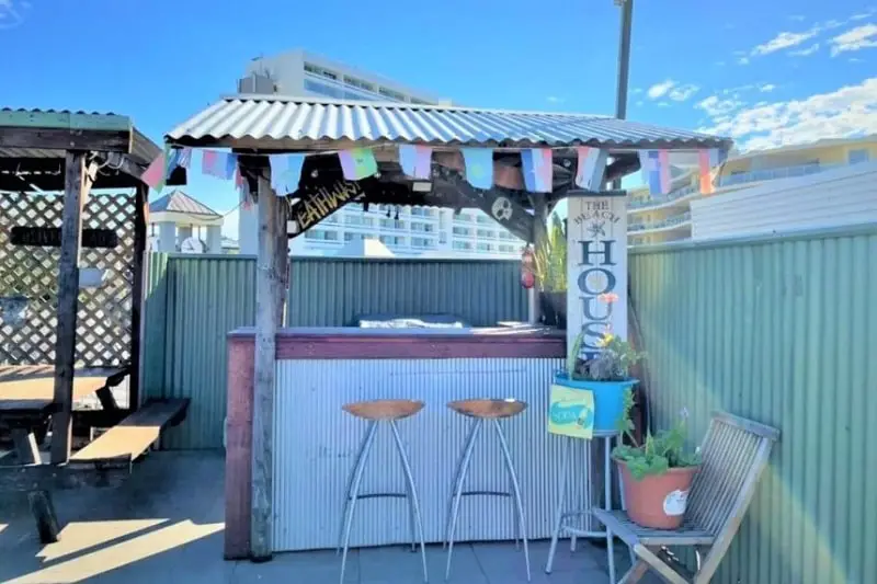 Rooftop tiki bar at Boardrider Backpackers in Manly, a great budget place to stay in Sydney, Australia.