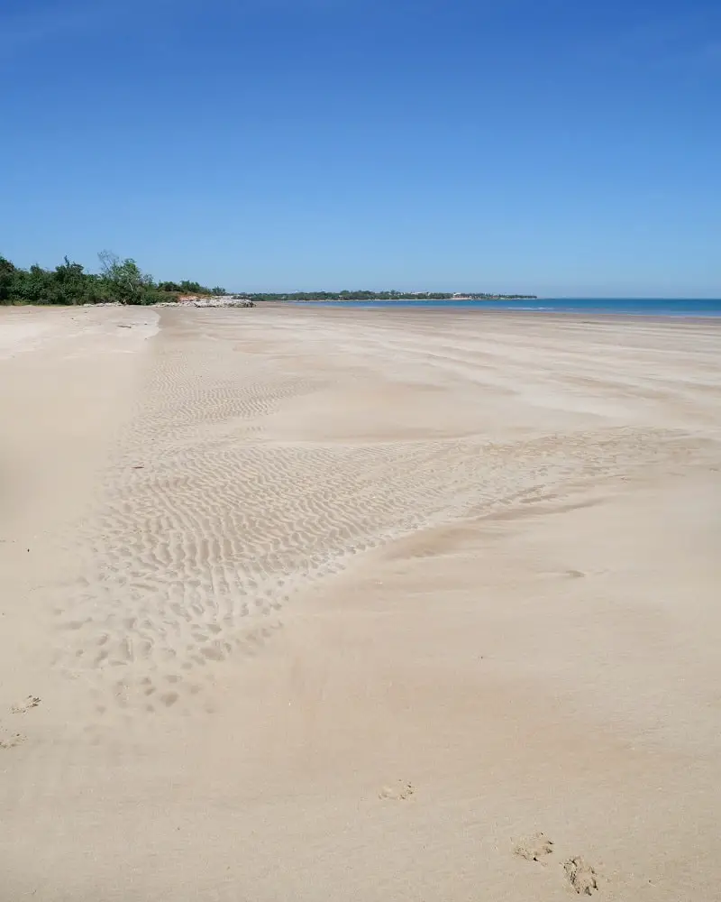 Patterns on the sand at huge Casuarina Beach, Australia.