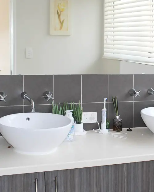 Sleek bathroom at a luxury house sit through Aussie House Sitters Australia.