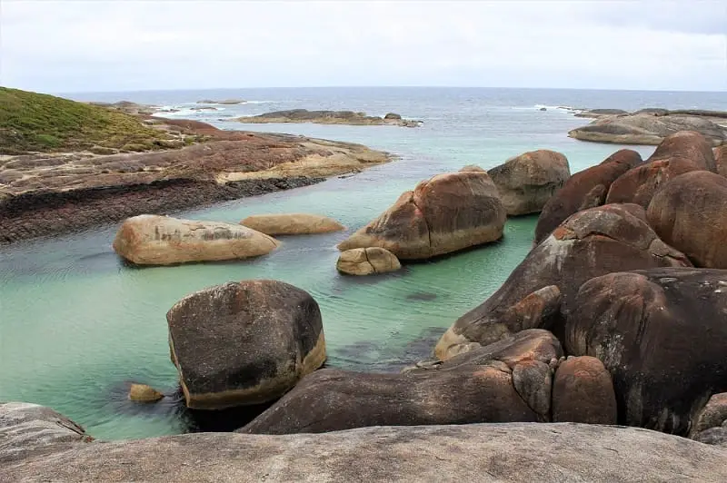 Elephant Rocks in Denmark, WA, with bright green ocean.