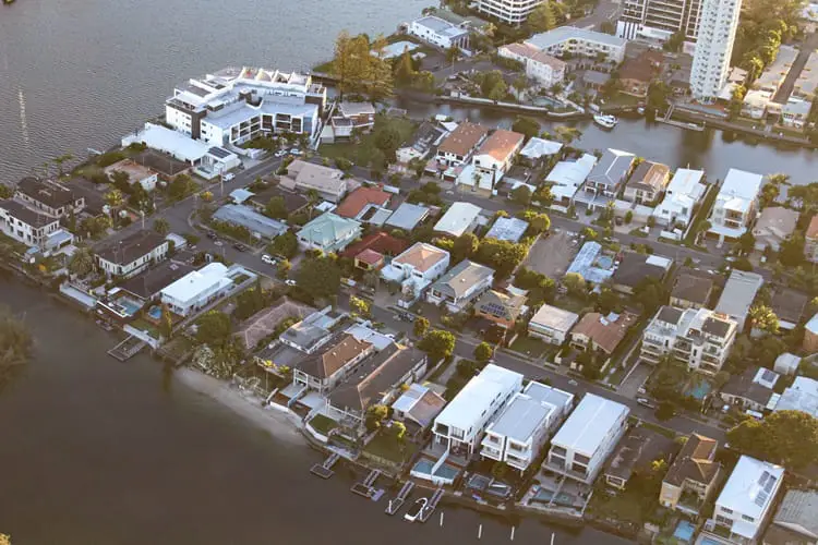 Aerial view of houses on the river in Surfers Paradise.